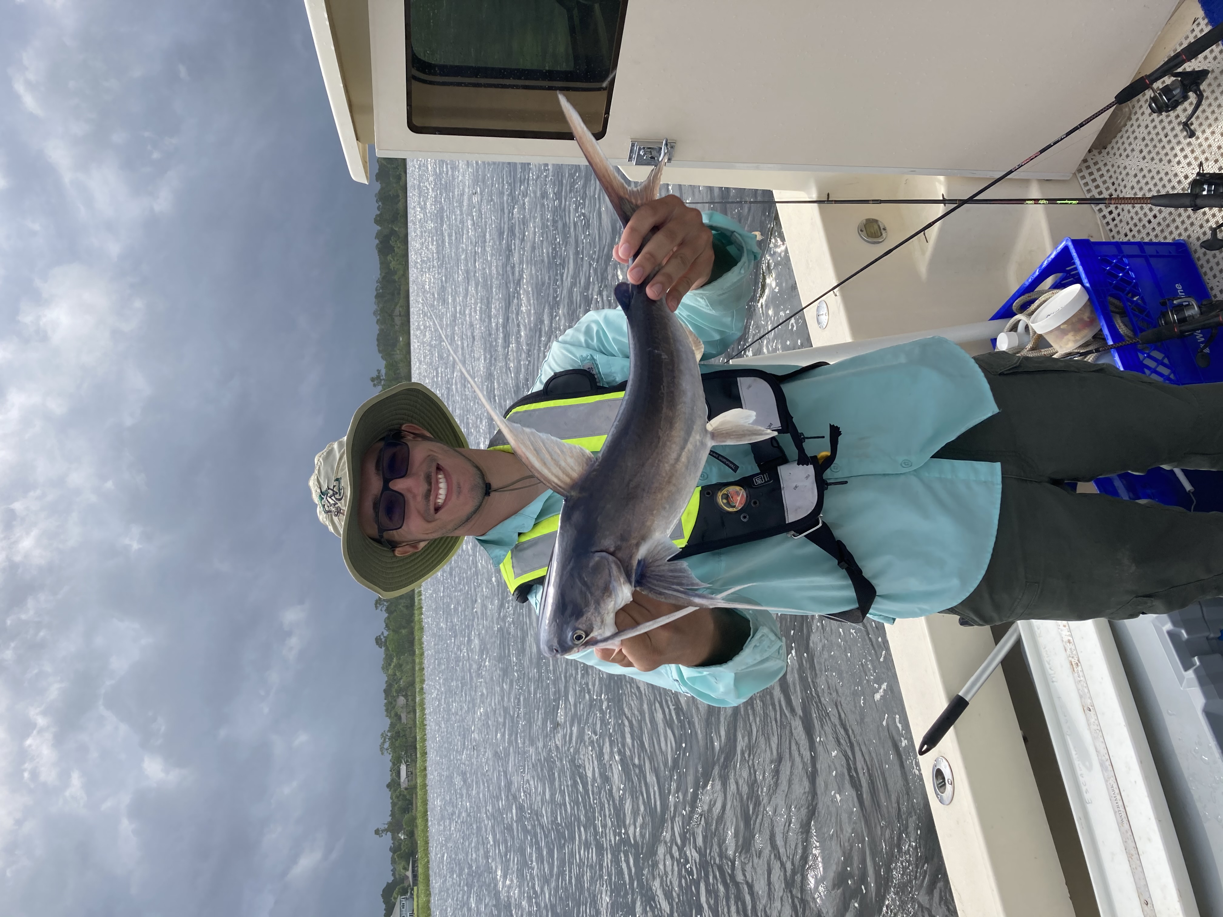 FWC Researchers holding fish 