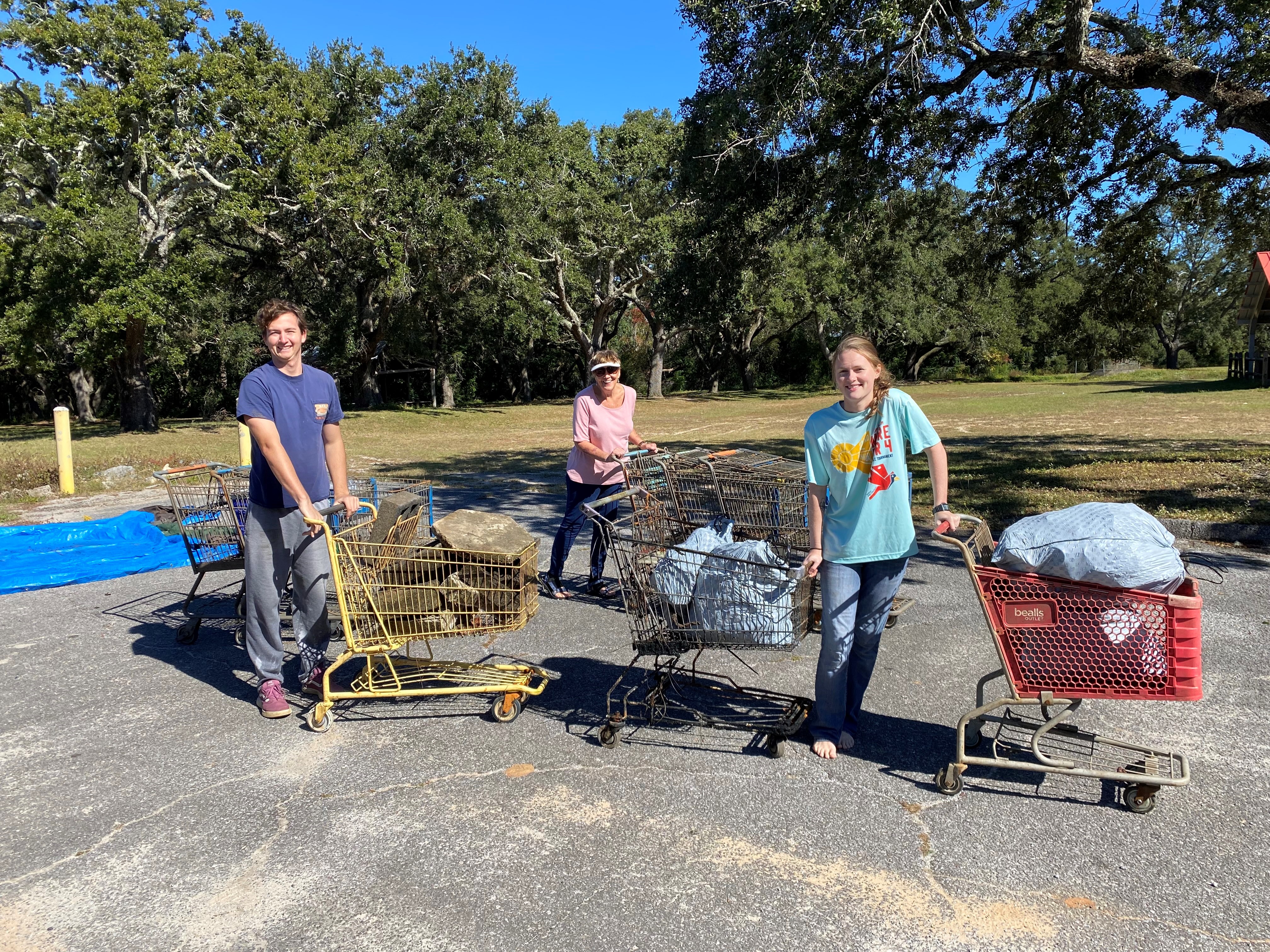 Volunteers with shopping carts removed from the creek