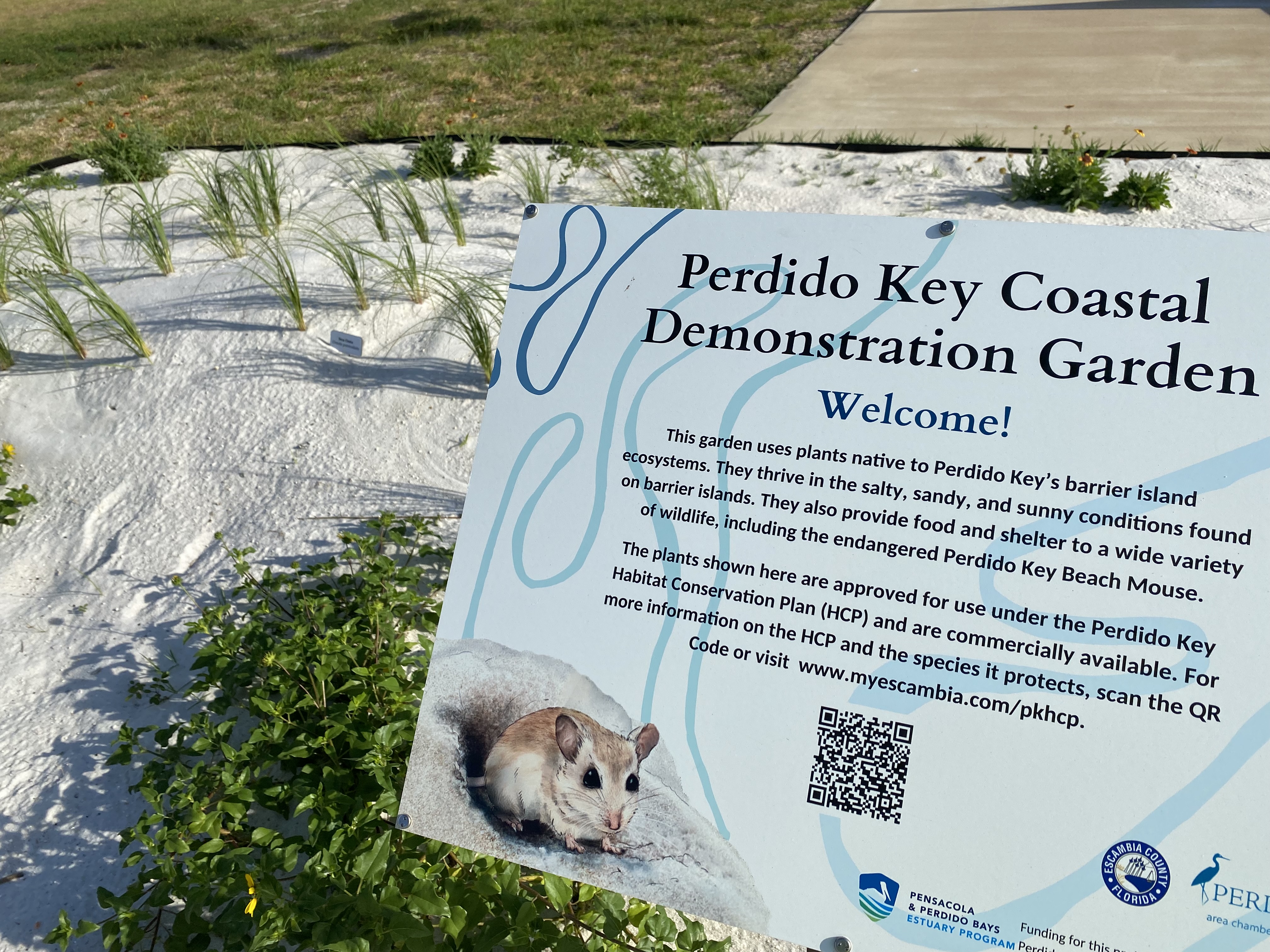 Educational Signage in front of coastal demonstration garden